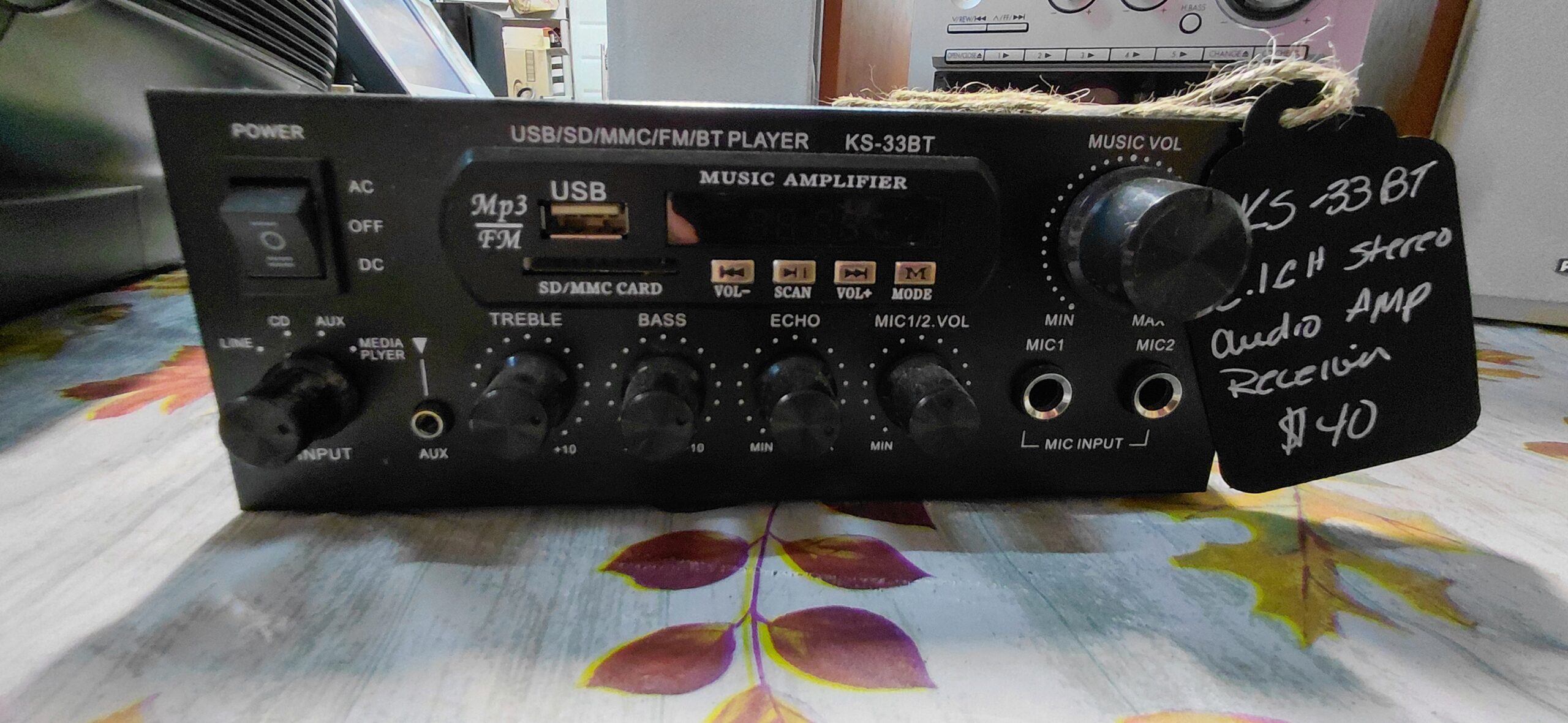 KS-33BT home audio amplifier front view with controls and display visible<br />
