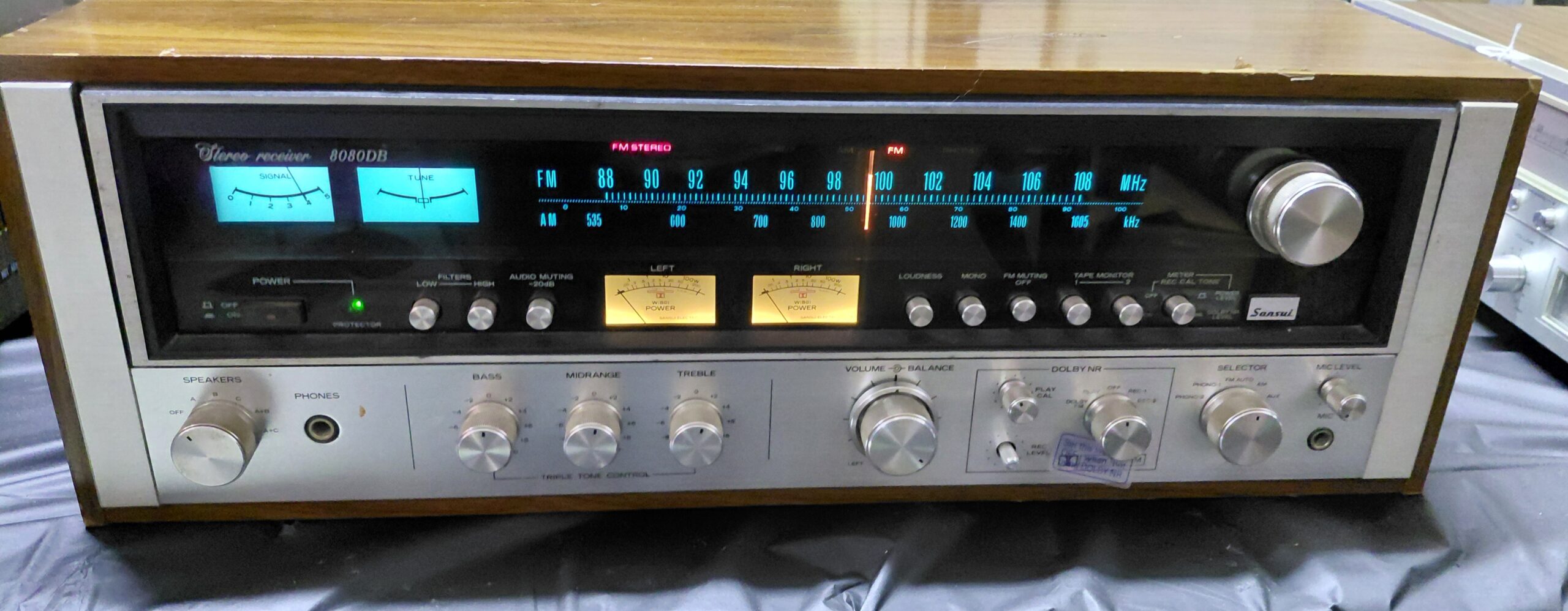 Sansui 8080DB vintage stereo receiver with illuminated FM tuner and analog power meters