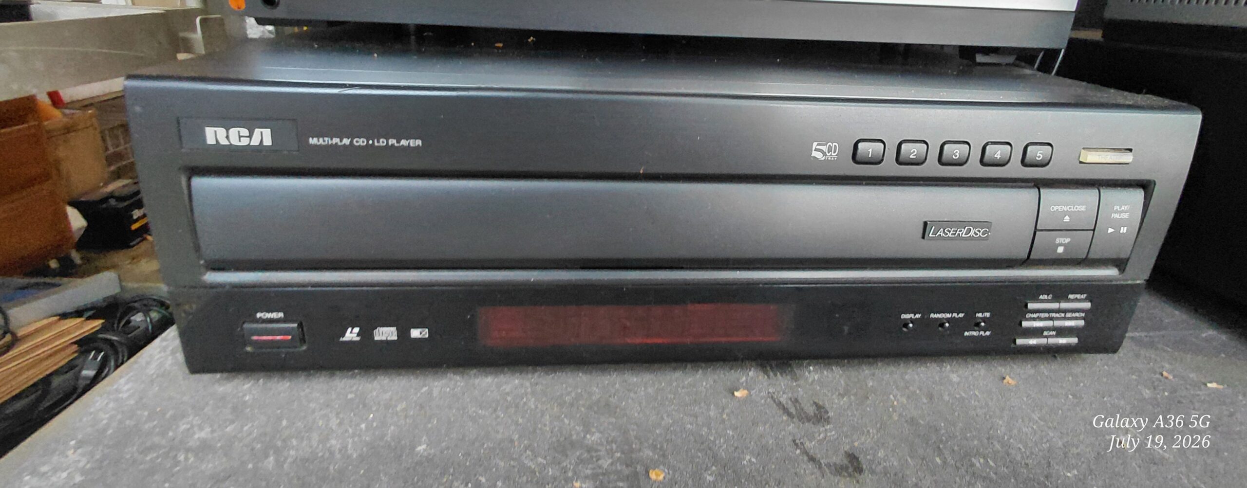 RCA 5-disc CD and LaserDisc combo player, front view showing disc selector buttons and display